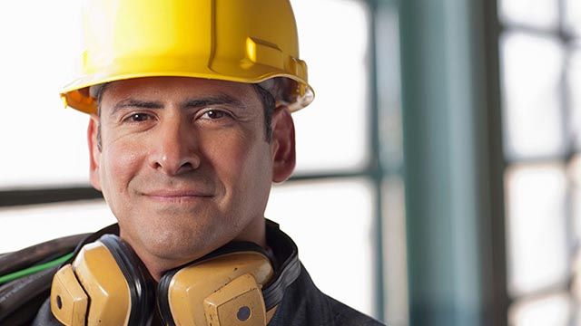 engineer wearing yellow safety equipment