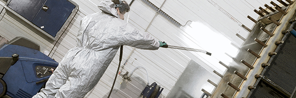 Man cleaning an Alfa Laval Compabloc heat exchanger